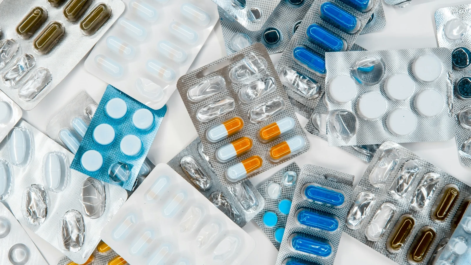 Blister packs of medication laid out on a counter